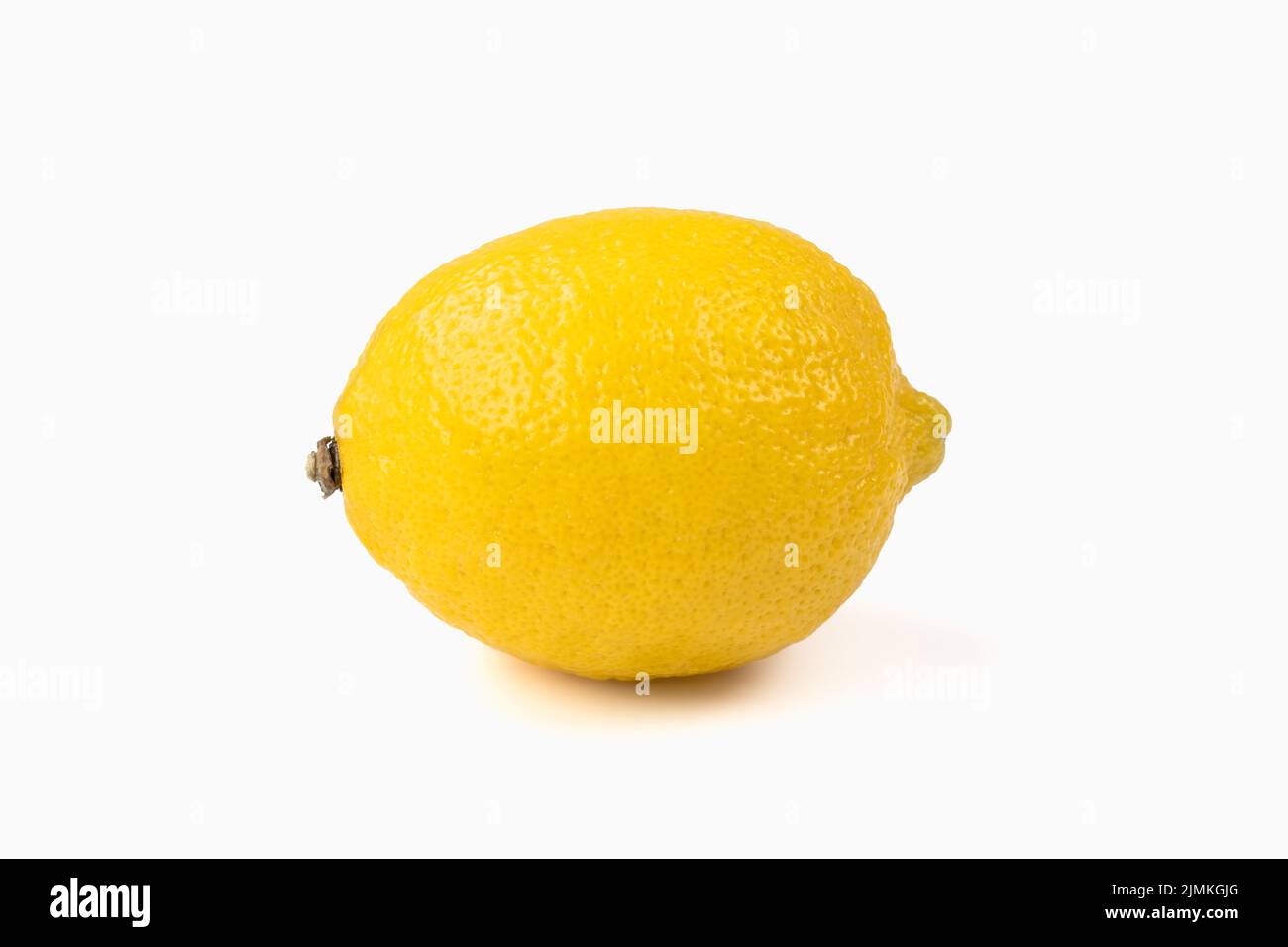 Fresh yellow lemon isolated on bright background. Close up view. Stock Photo