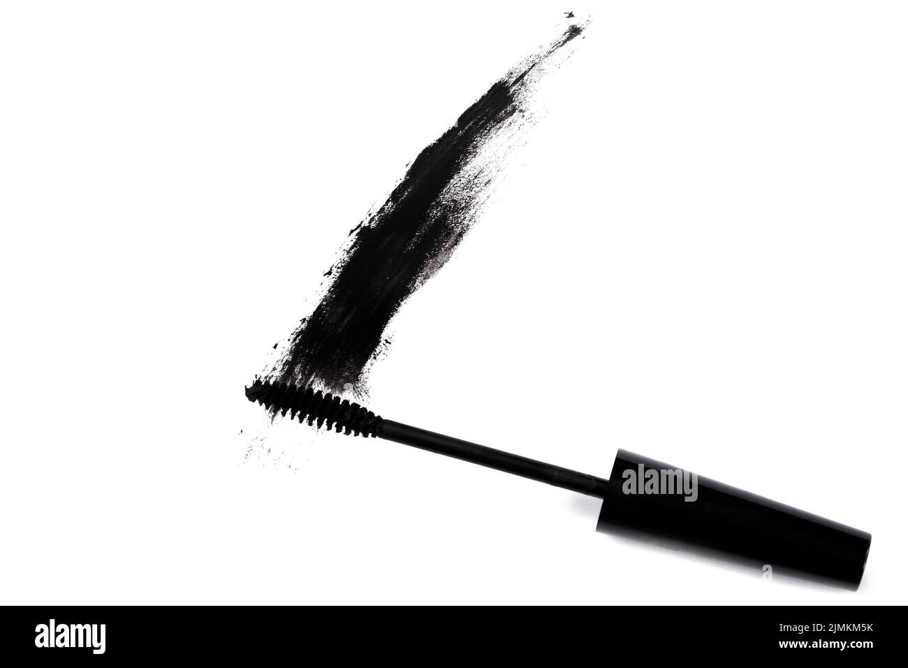 Black wand and smudged mascara on white background Stock Photo Alamy