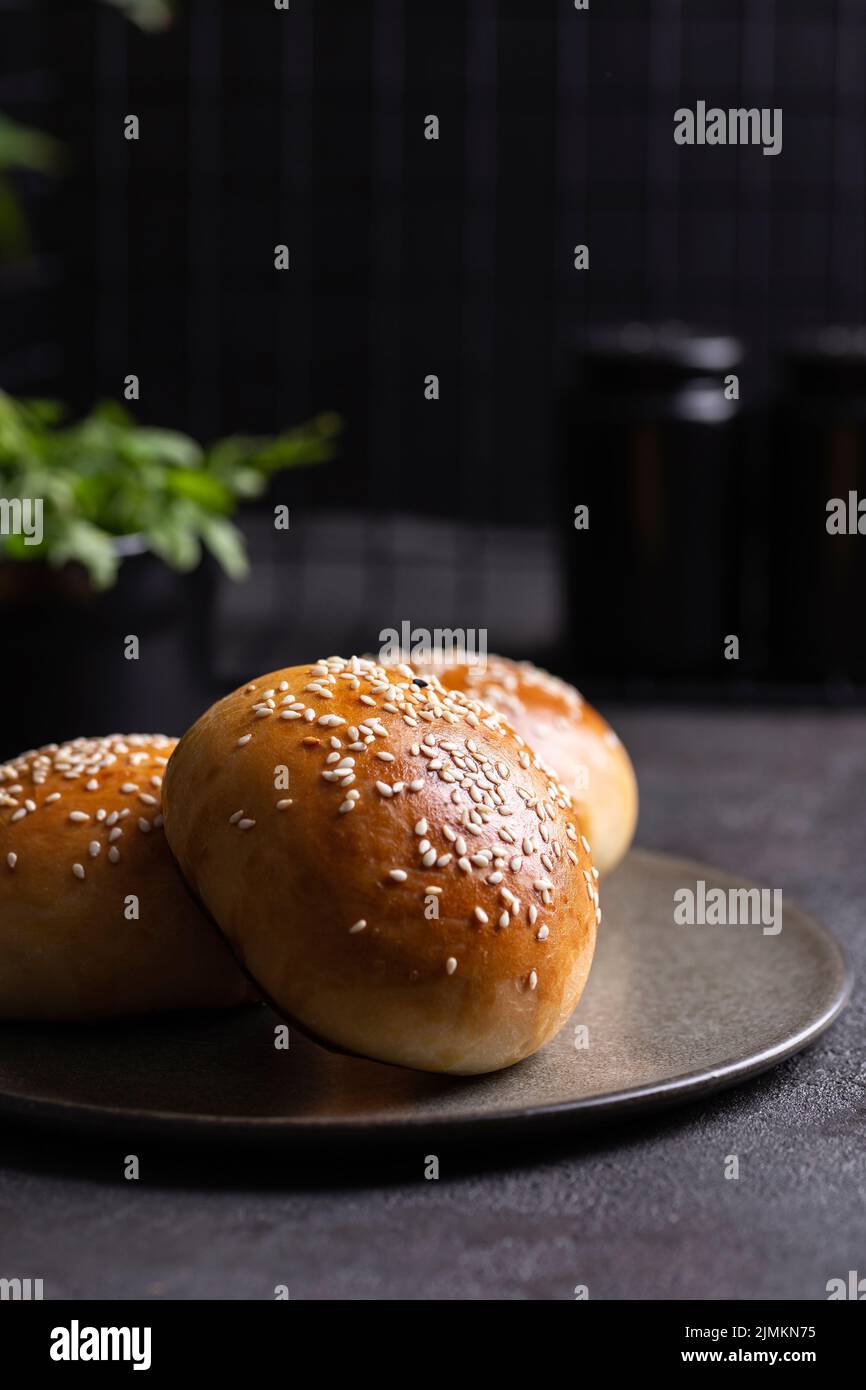 Burger buns with sesame seeds Stock Photo Alamy