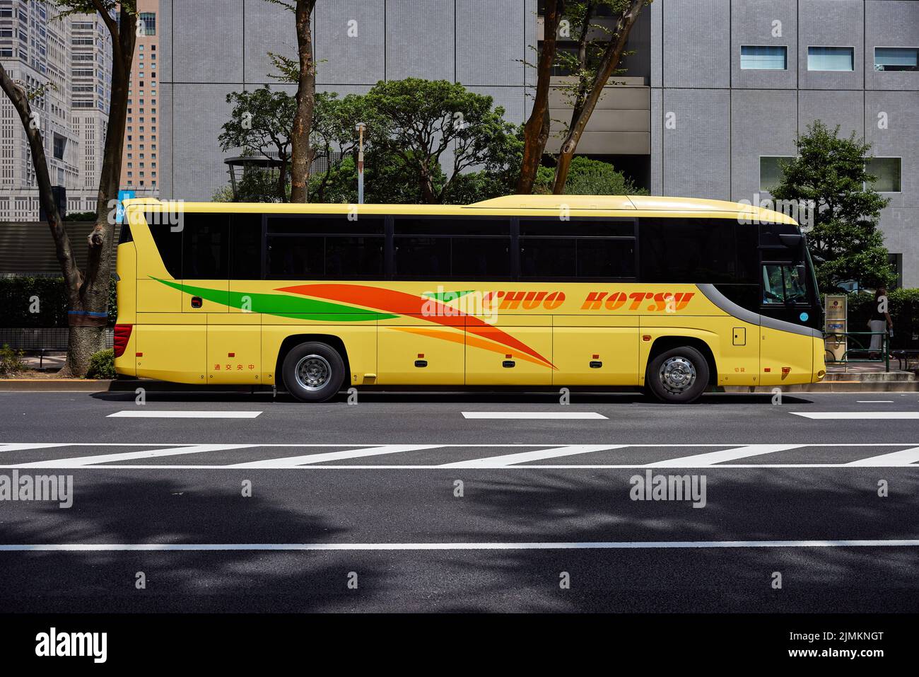 Chuo Kotsu, yellow bus; Shinjuku, Tokyo, Japan Stock Photo