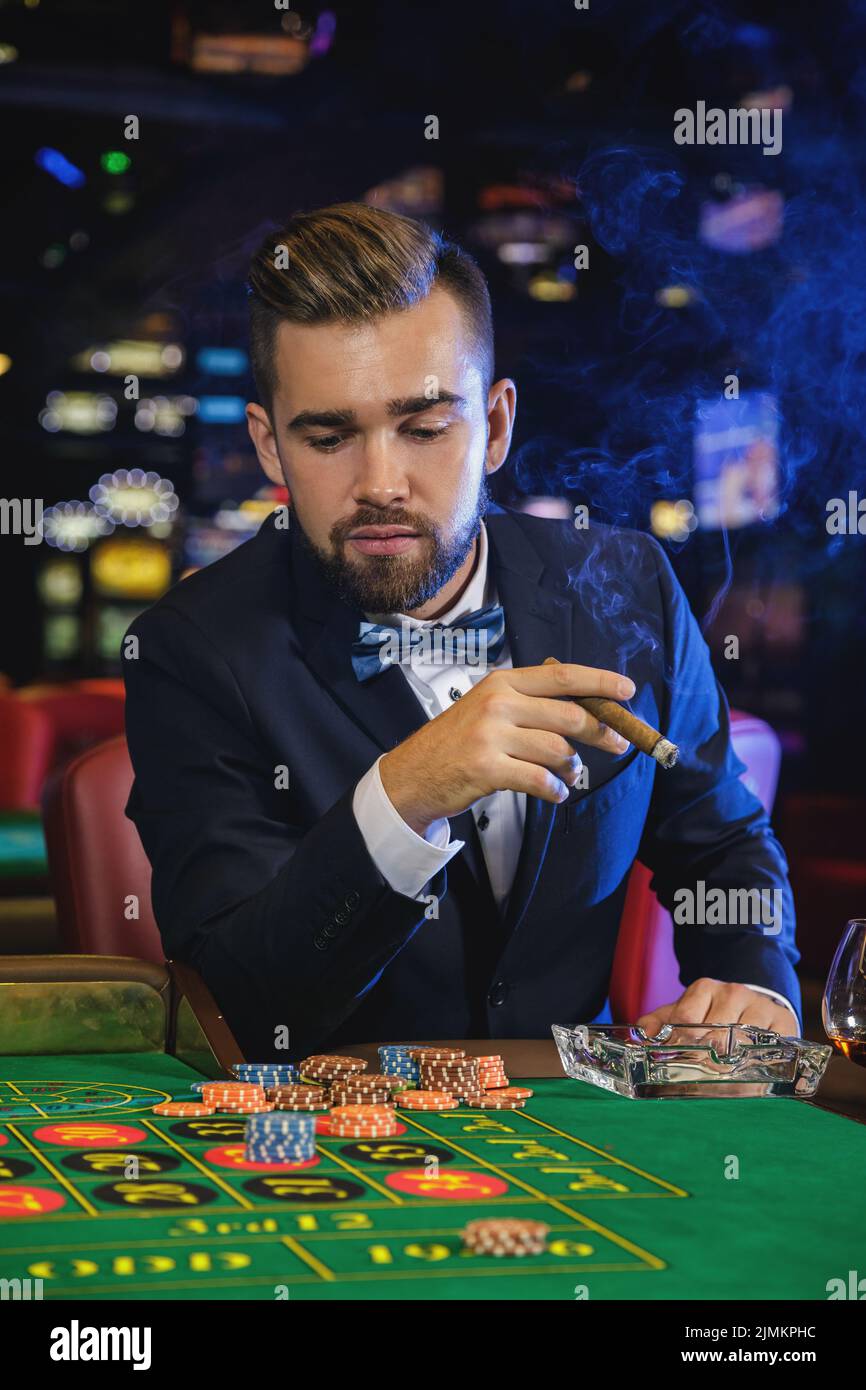 Rich cigar man suit hires stock photography and images Alamy
