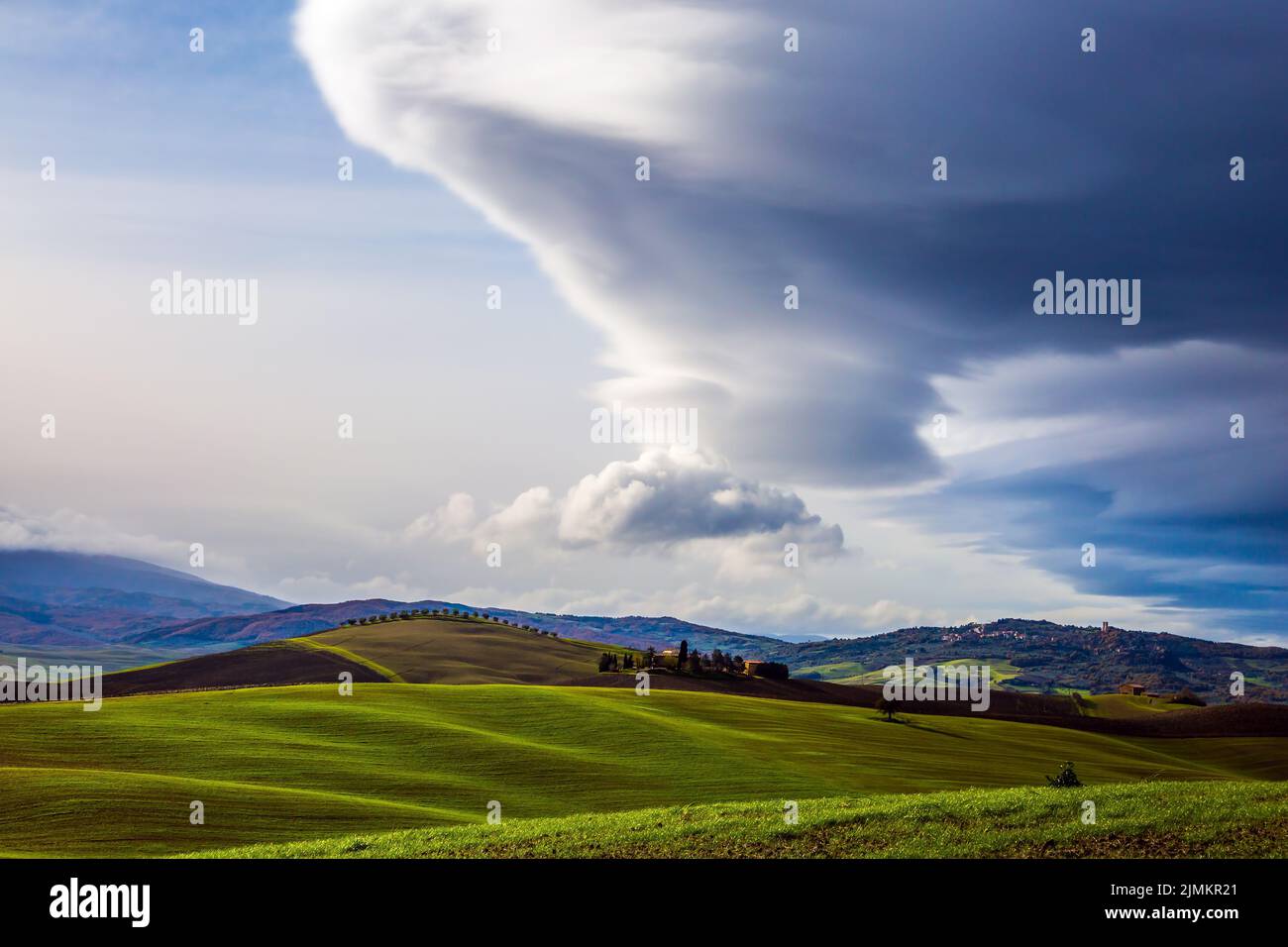Gorgeous  clouds over Tuscany hills Stock Photo