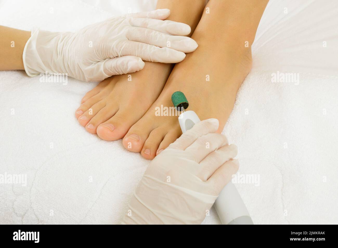 Female Feet And Callus Remover Tool Stock Photo - Download Image