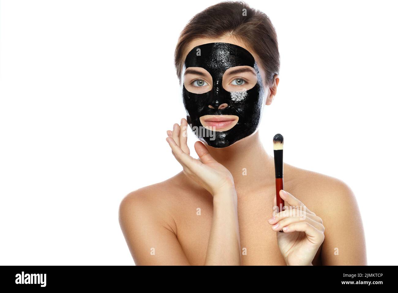 Black woman applying beauty mask hi-res stock photography and images ...