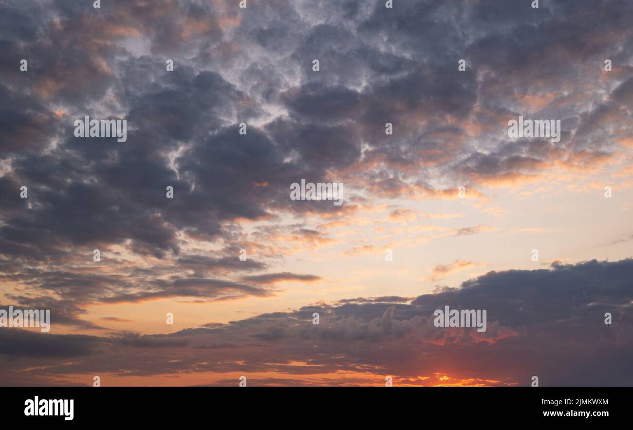 Summer sunset sky with clouds Stock Photo - Alamy