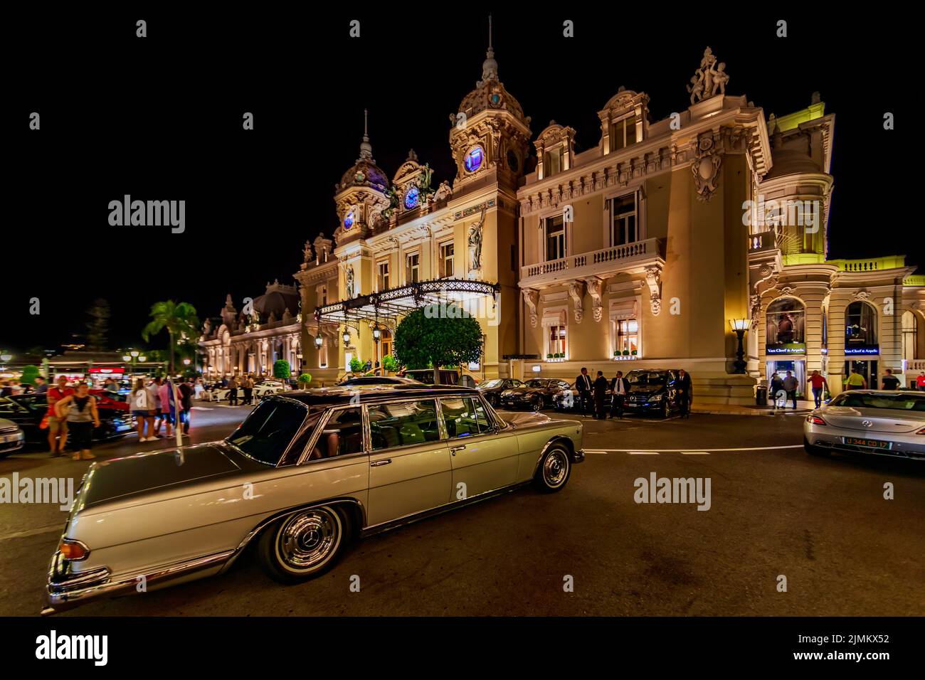 Monaco, Monte Carlo, 21 August 2019: Vintage Mercedes Benz car near the hotel Paris and casino in night, lights of the place Cas Stock Photo