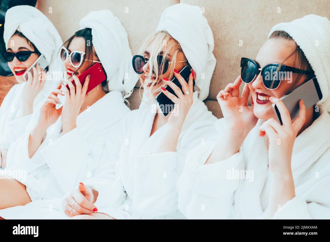 rich women leisure spa therapy posh ladies phones Stock Photo