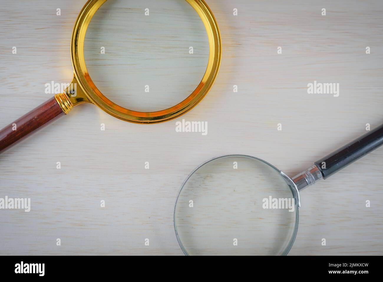 Notes and magnifying glass image Stock Photo Alamy