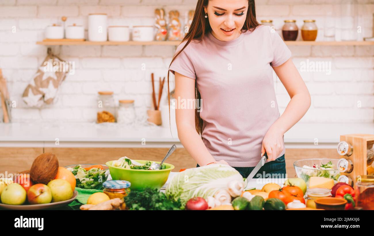 cooking hobby healthy nutrition woman salad home Stock Photo