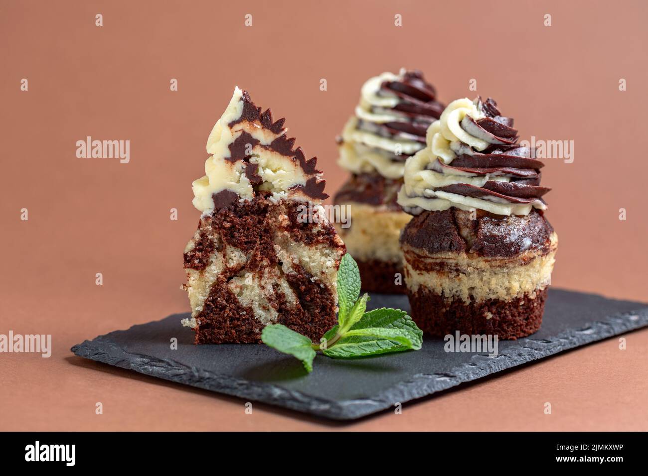 Marble chocolate and vanilla cupcakes. Stock Photo