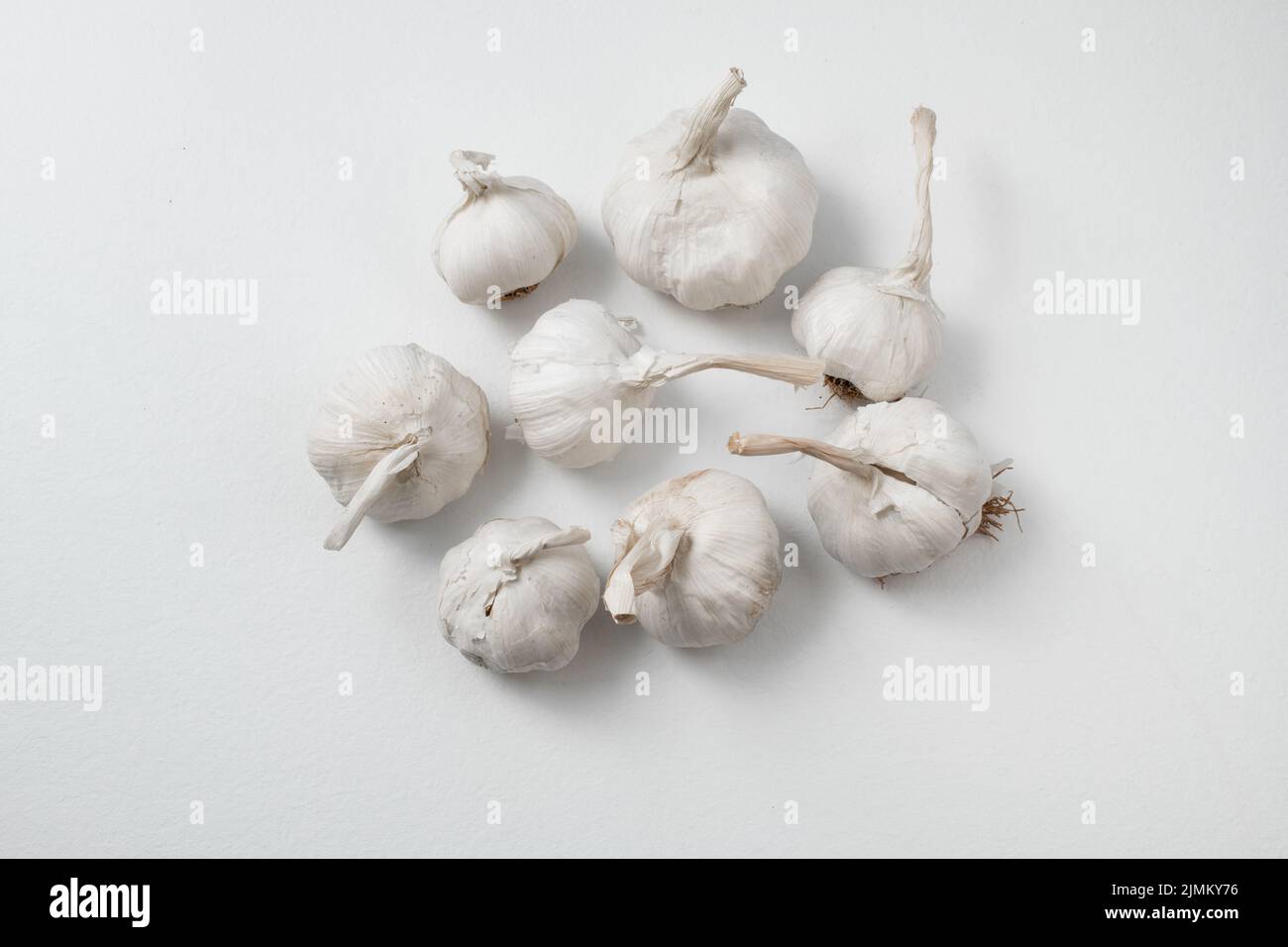 Garlic Cloves and Bulb on white background Stock Photo - Alamy