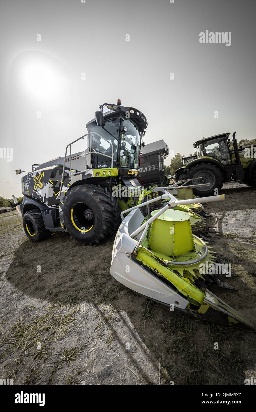 A vertical shot of a wrapped Claas Jaguar by Gomiero Farm Stock Photo