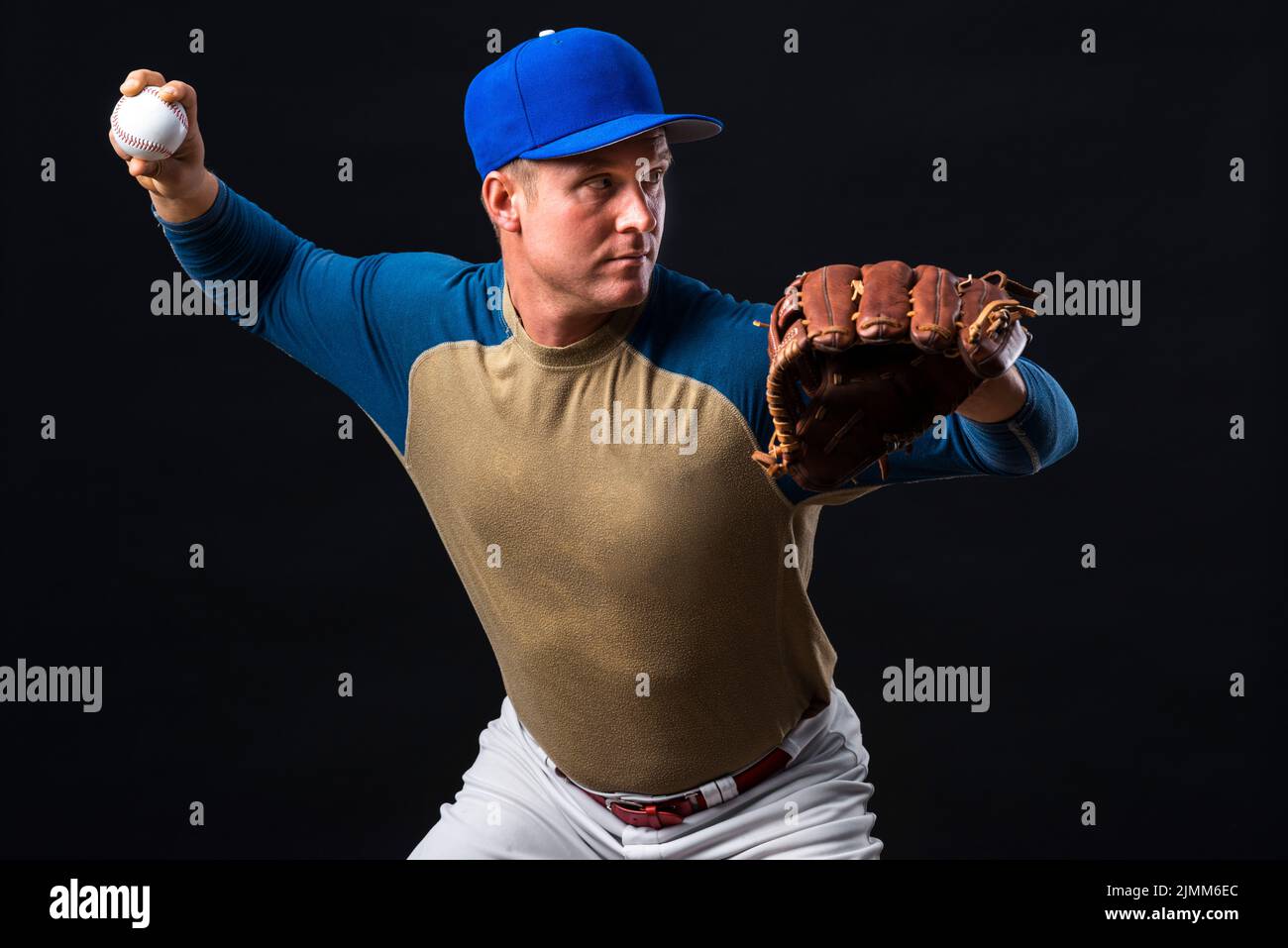Man posing with baseball glove ball Stock Photo