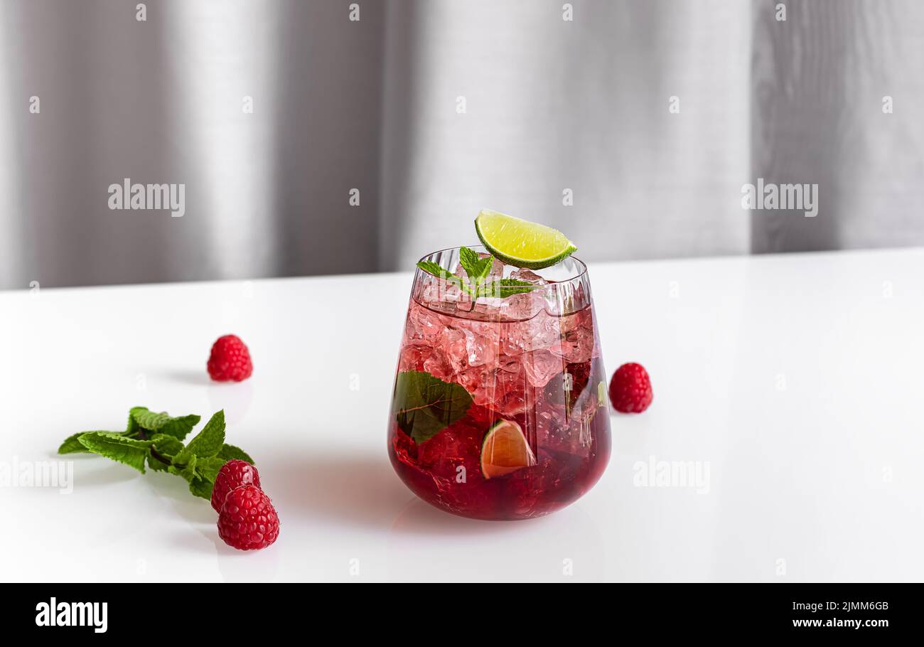 A glass of raspberry daiquiri, alcoholic cocktail or mocktail with