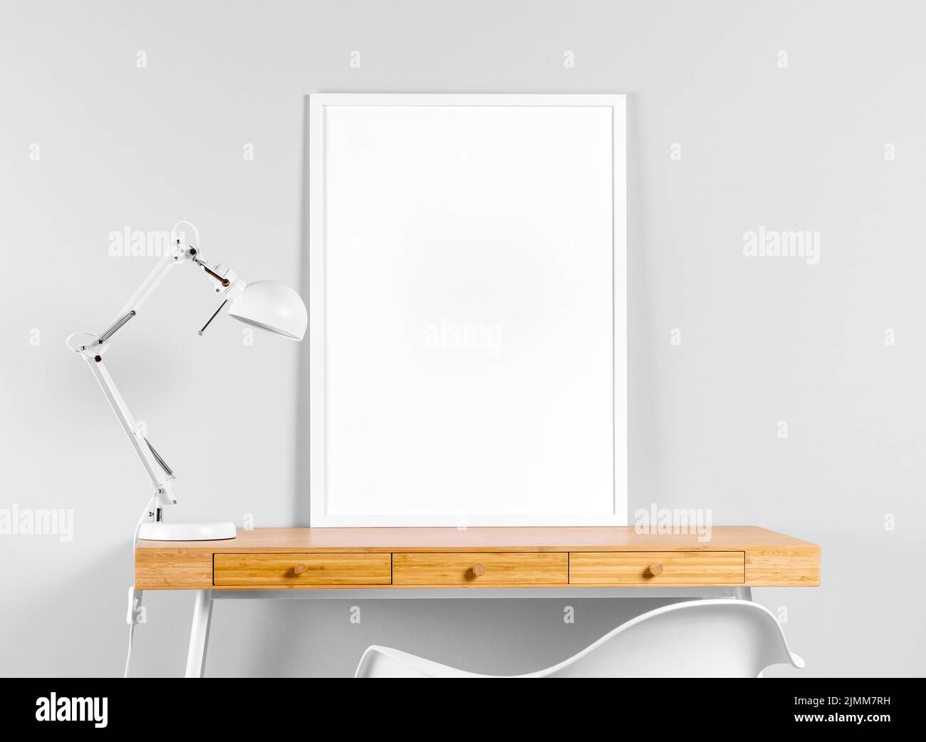 Frame mock up table beside lamp Stock Photo