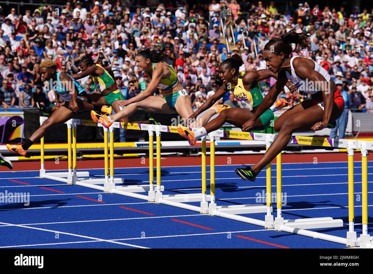 England's Cindy Sember (right) during Women's 100m Hurdles - Final at Alexander Stadium on day ten of the 2022 Commonwealth Games in Birmingham. Picture date: Sunday August 7, 2022. Stock Photo