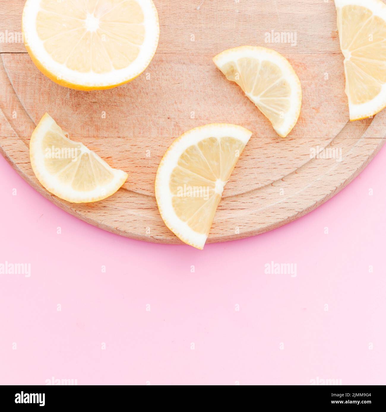 Lemon slices cutting board Stock Photo