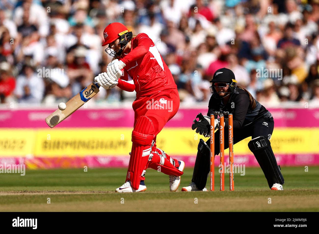 Commonwealth Games - Women's Cricket T20 - England v New Zealand - Bronze Medal - Edgbaston Stadium, Britain - August 7, 2022 England's Sophie Ecclestone hits a four of the bowling off New Zealand's Brooke Halliday REUTERS/Jason Cairnduff Stock Photo