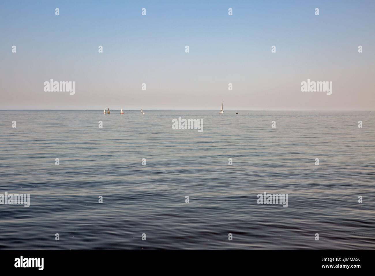 Sea of Azow peaceful waterscape with sailboats in Mariupol, Ukraine. Stock Photo
