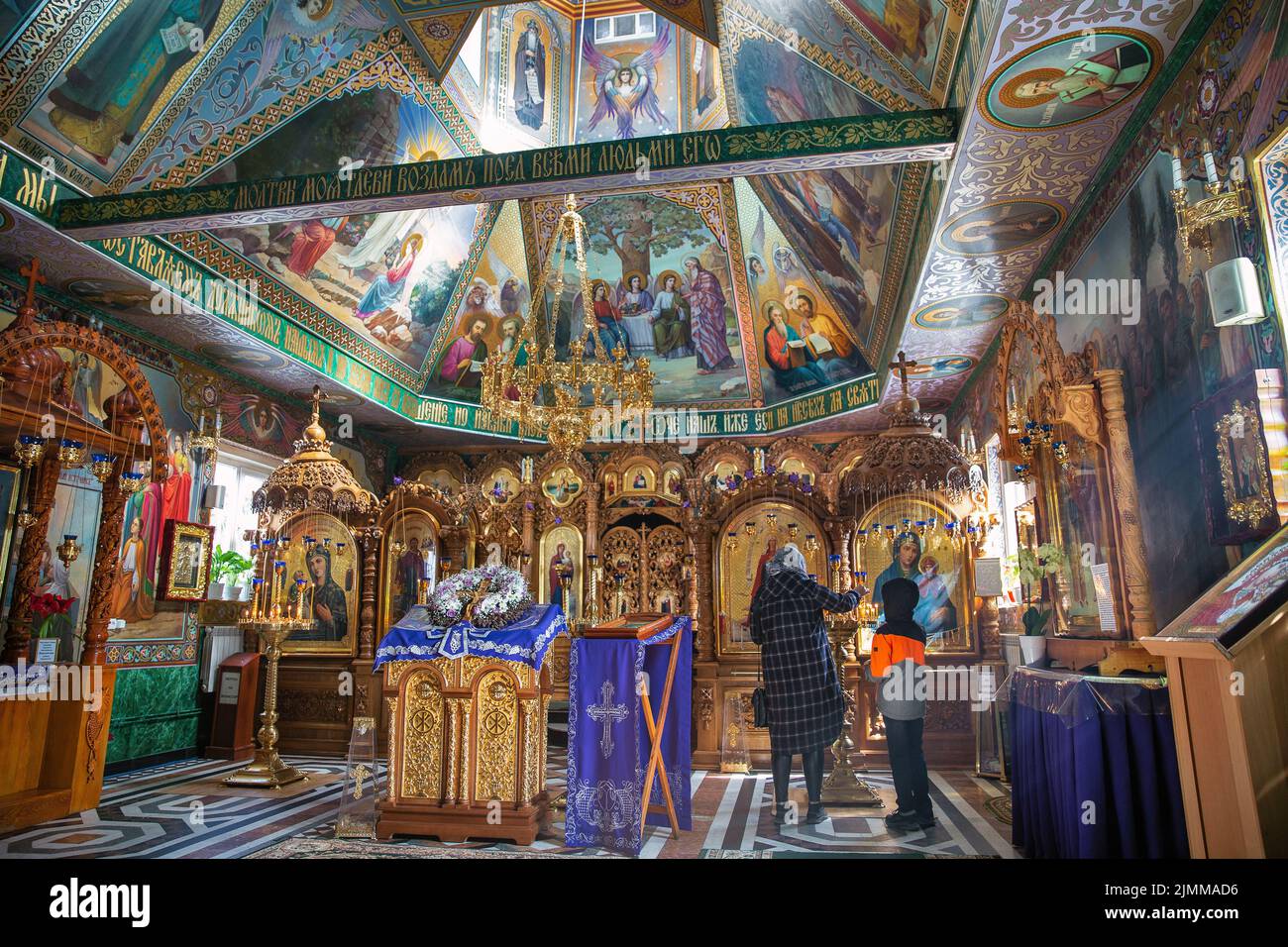 People visit church in miraculous spring of St. Anna in Monastery of St. Nicholas convent. Onyshkivtsi, Western Ukraine. Stock Photo