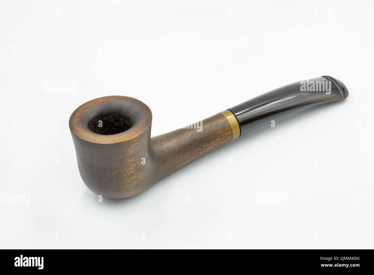 Wooden pipe for tobacco smoking closeup against white Stock Photo