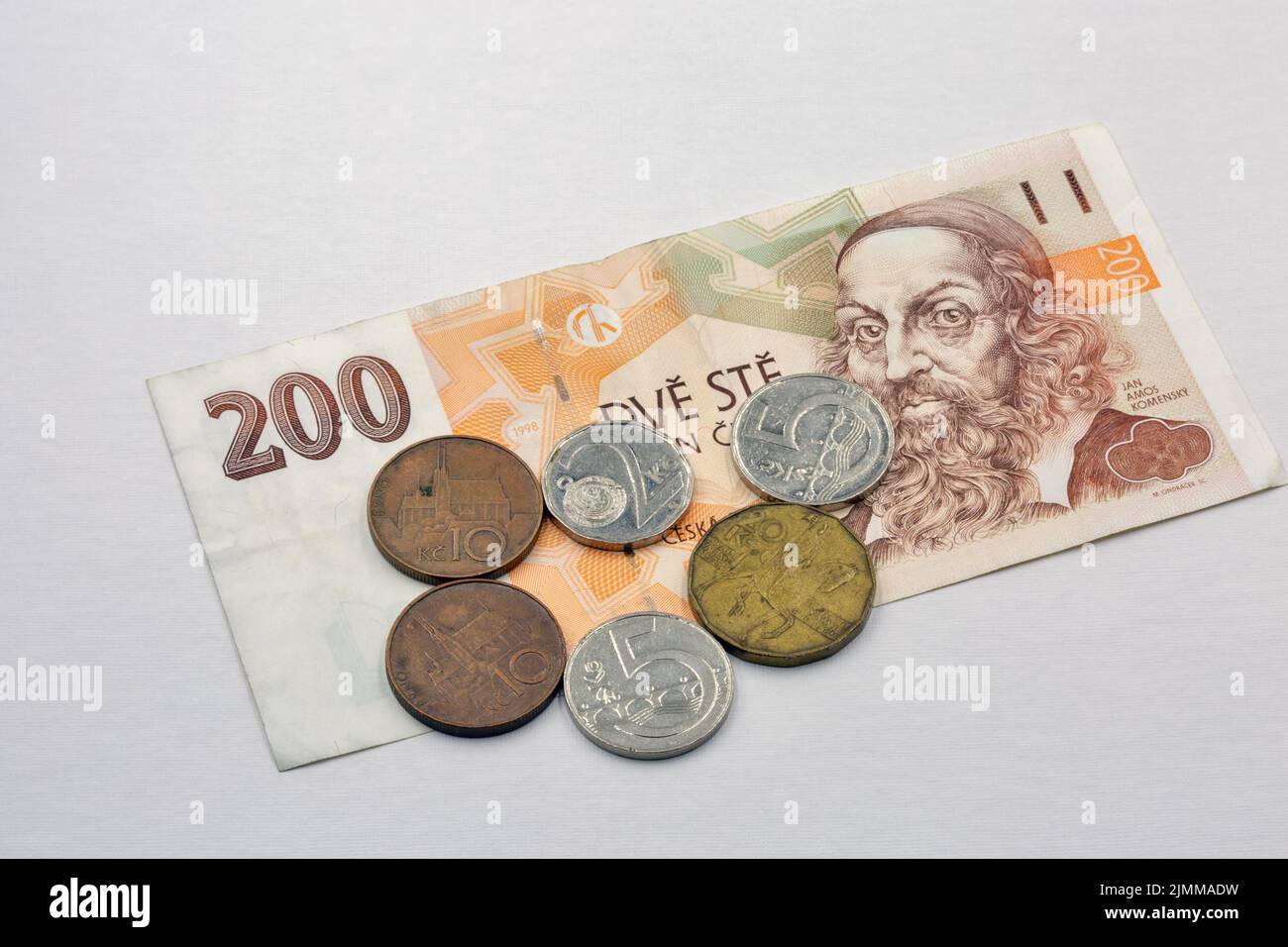 paper money and coins of Czech Republic with portrait of John Amos Comenius teacher, educator and writer Stock Photo