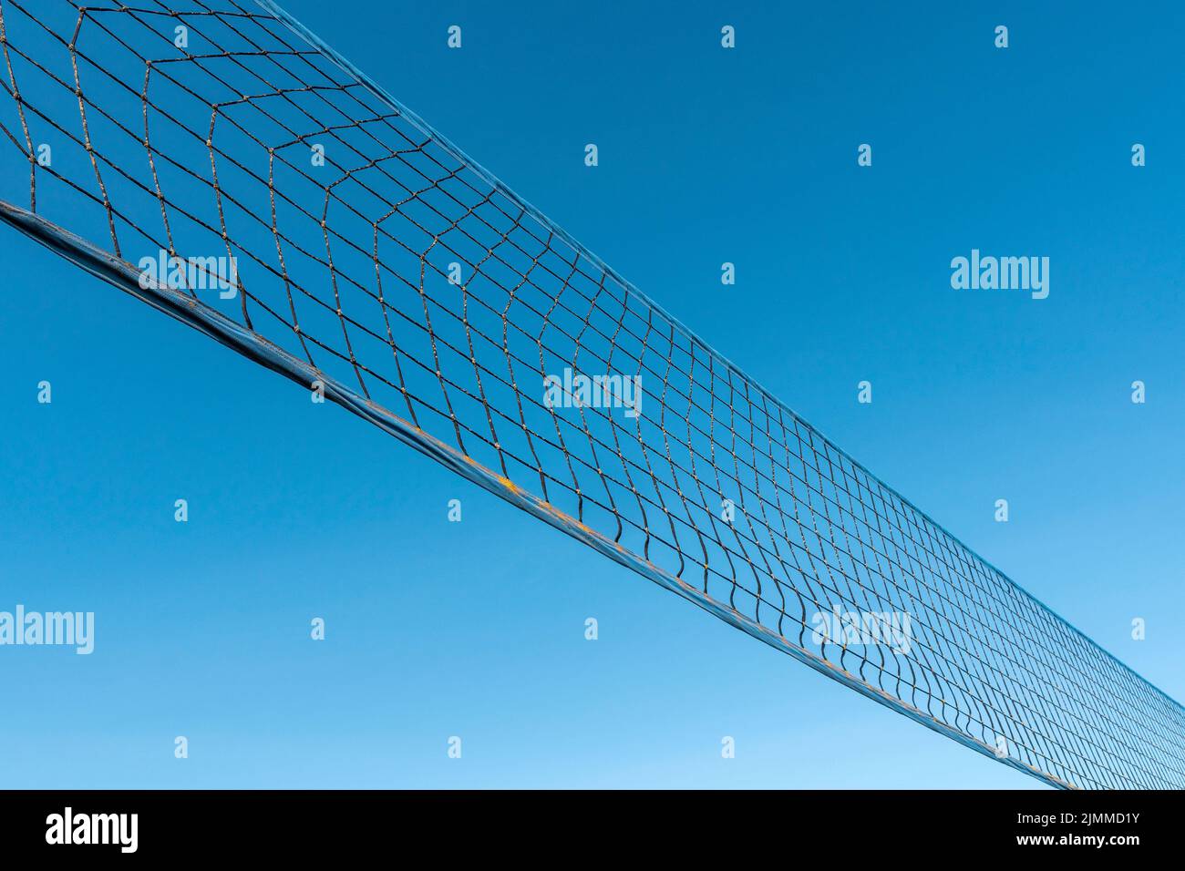 Volleyball net on the community park with clear blue sky Stock Photo Alamy