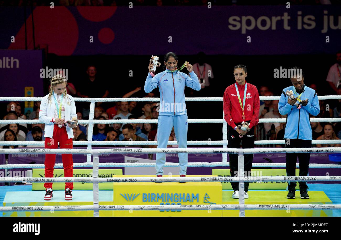 Silver medalist England's Demie-Jade Resztan (left), gold medalist India's Nitu Nitu (centre) and bronze medalists Canada's Dhillon Priyanka (second right) and Botswana's Lethabo Modukanele after the Women's Minimum (45-48kg) at The NEC on day ten of the 2022 Commonwealth Games in Birmingham. Picture date: Sunday August 7, 2022. Stock Photo