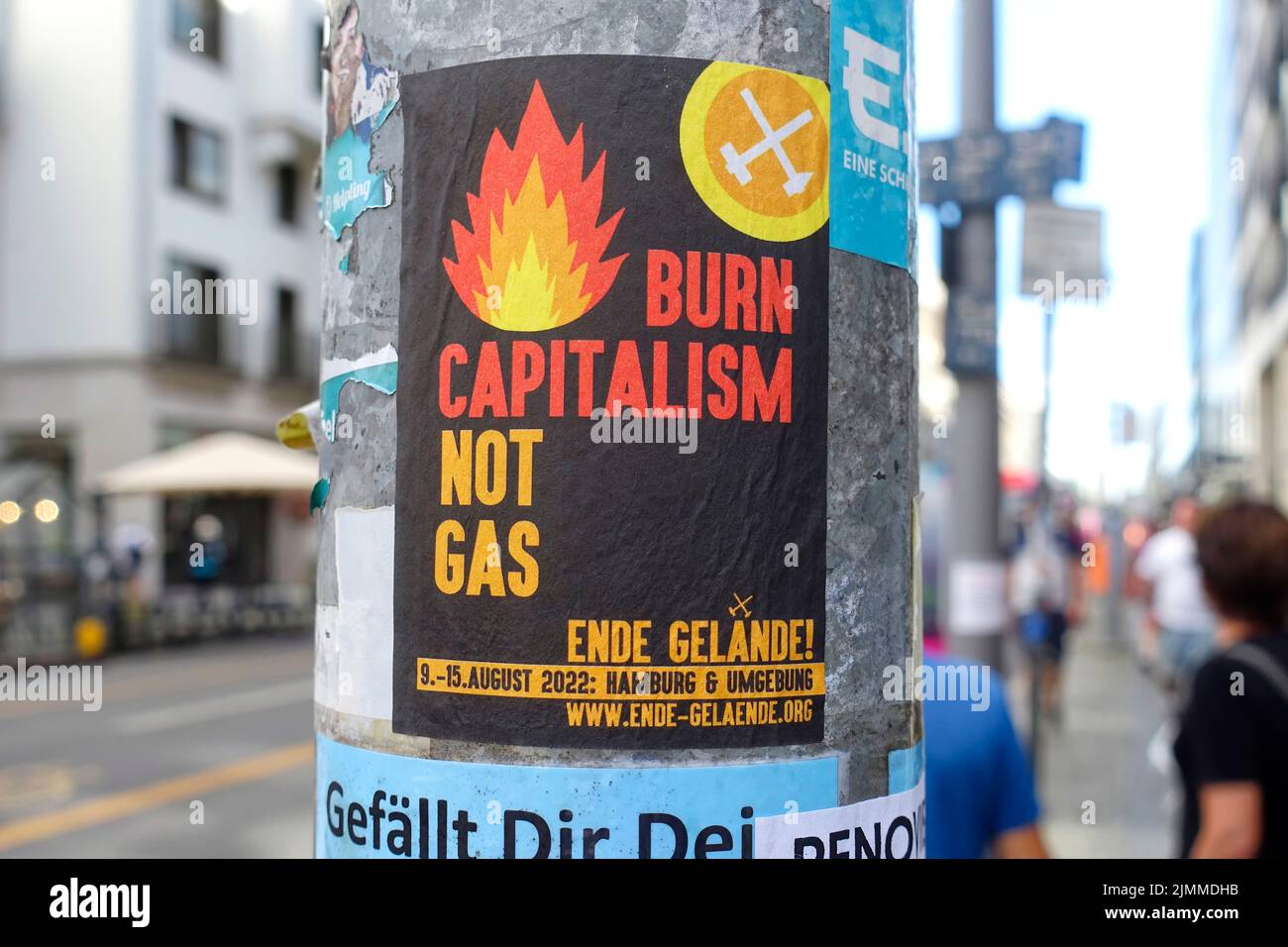 Burn capitalism, not gas, sticker in Berlin Stock Photo