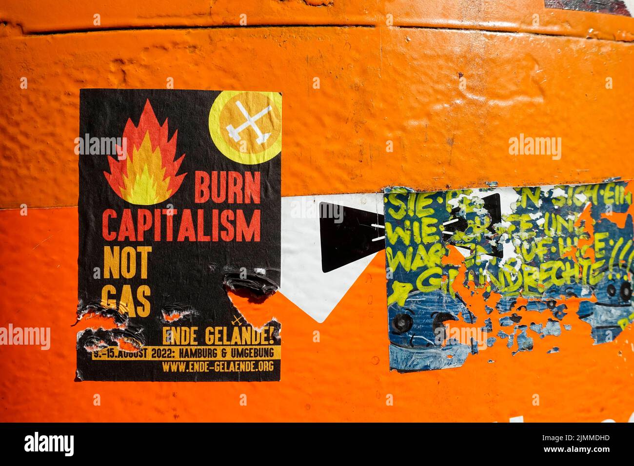 Burn capitalism, not gas, sticker in Berlin Stock Photo