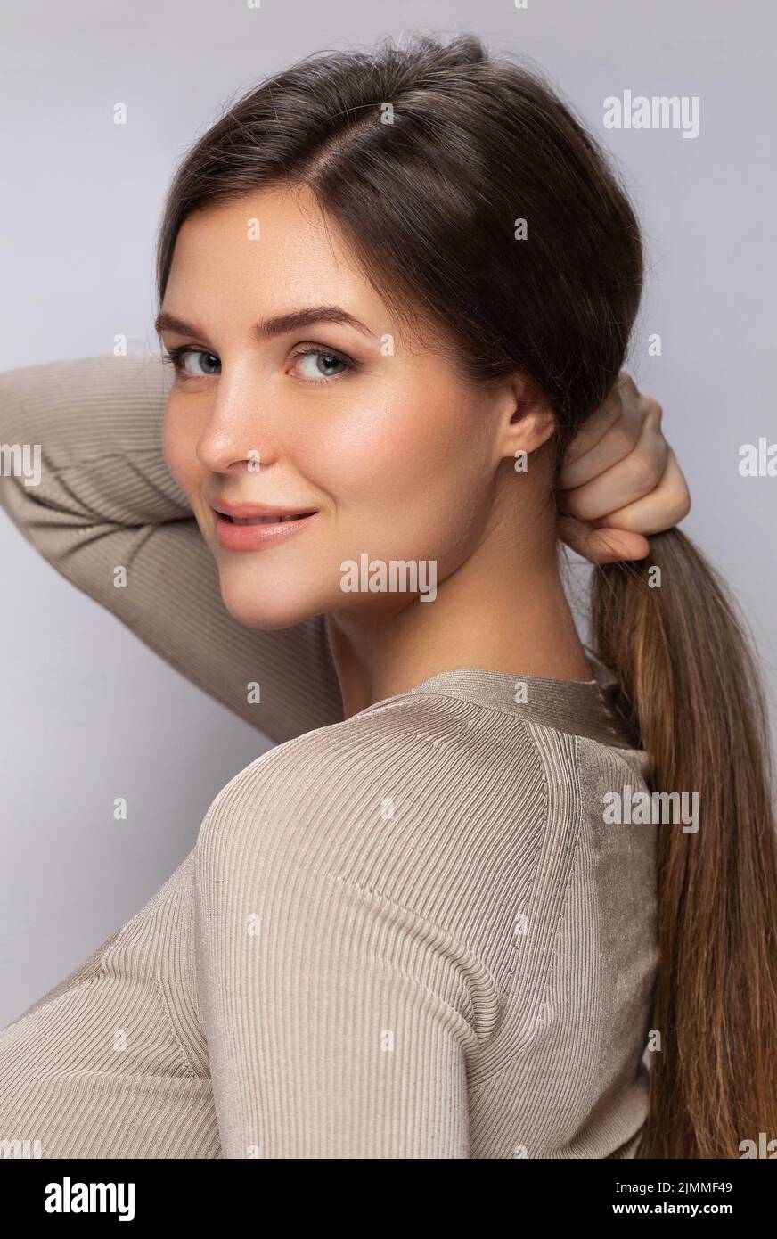 Young pretty woman with a beautiful long hair Stock Photo - Alamy