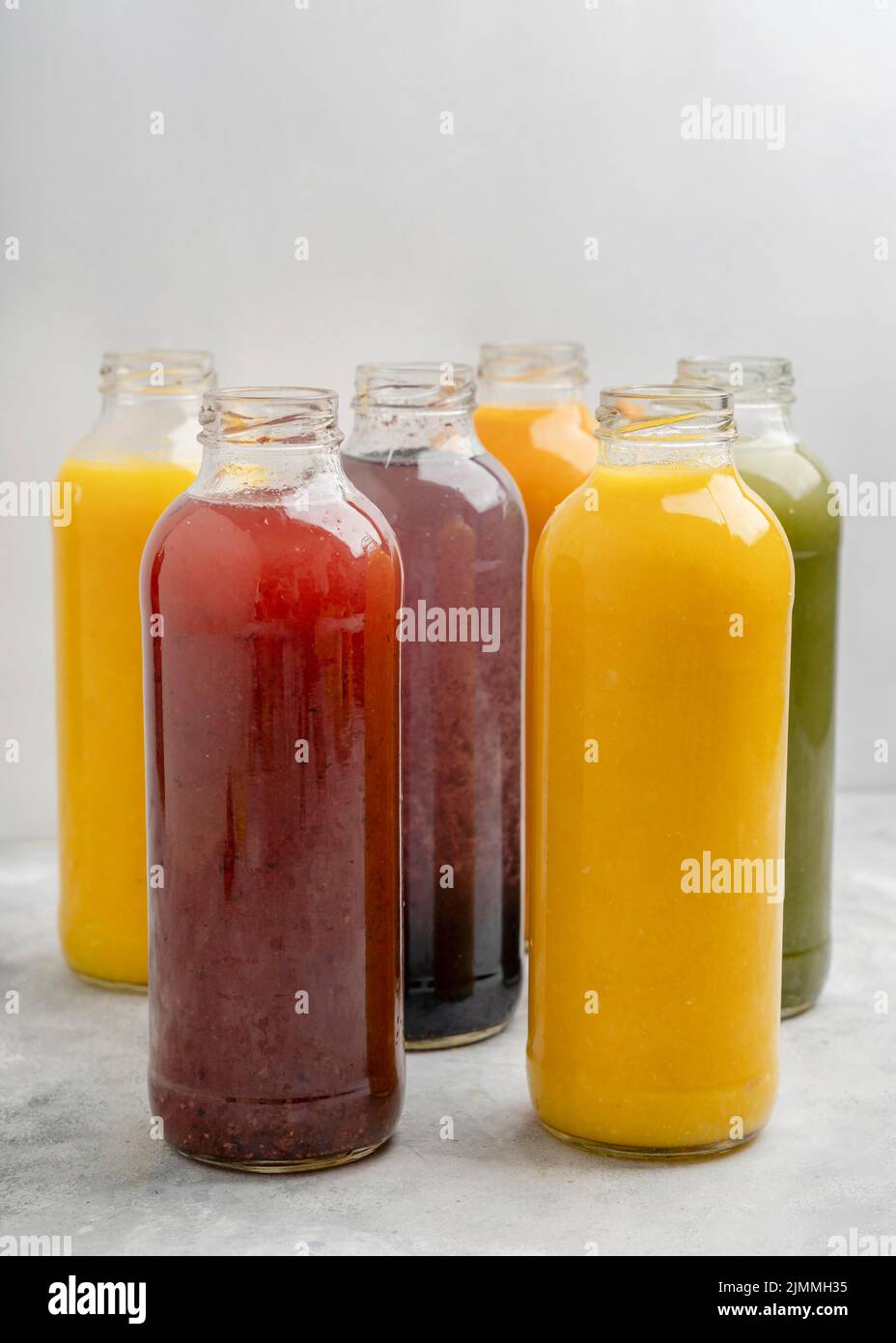 Healthy juice bottles arrangement Stock Photo Alamy