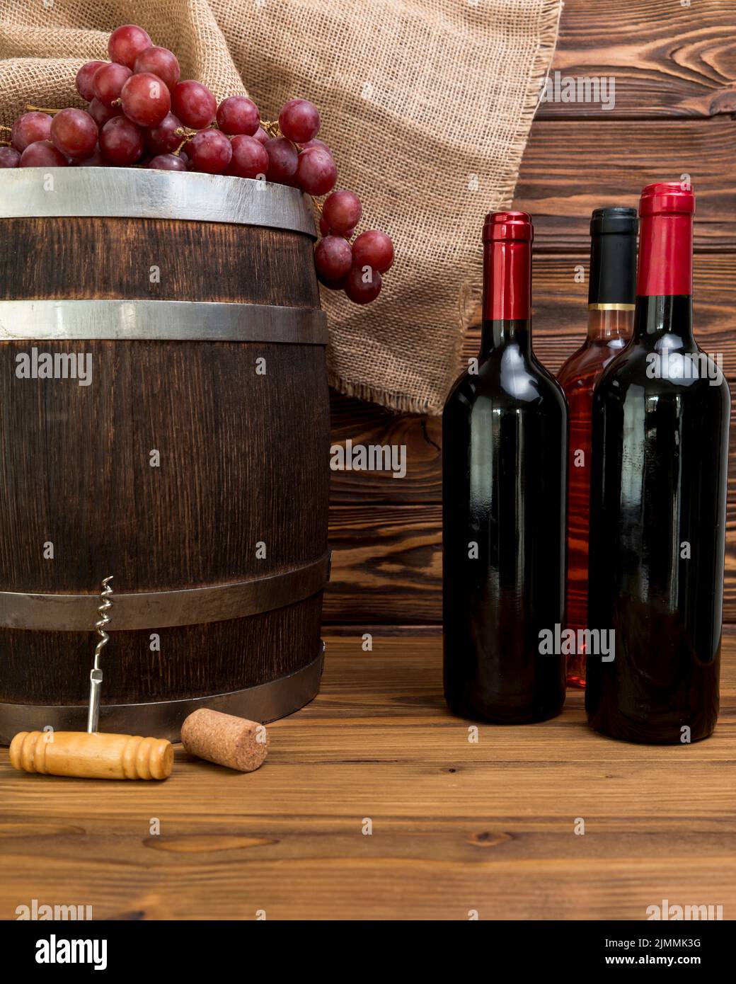 Bottles wine with barrel Stock Photo Alamy