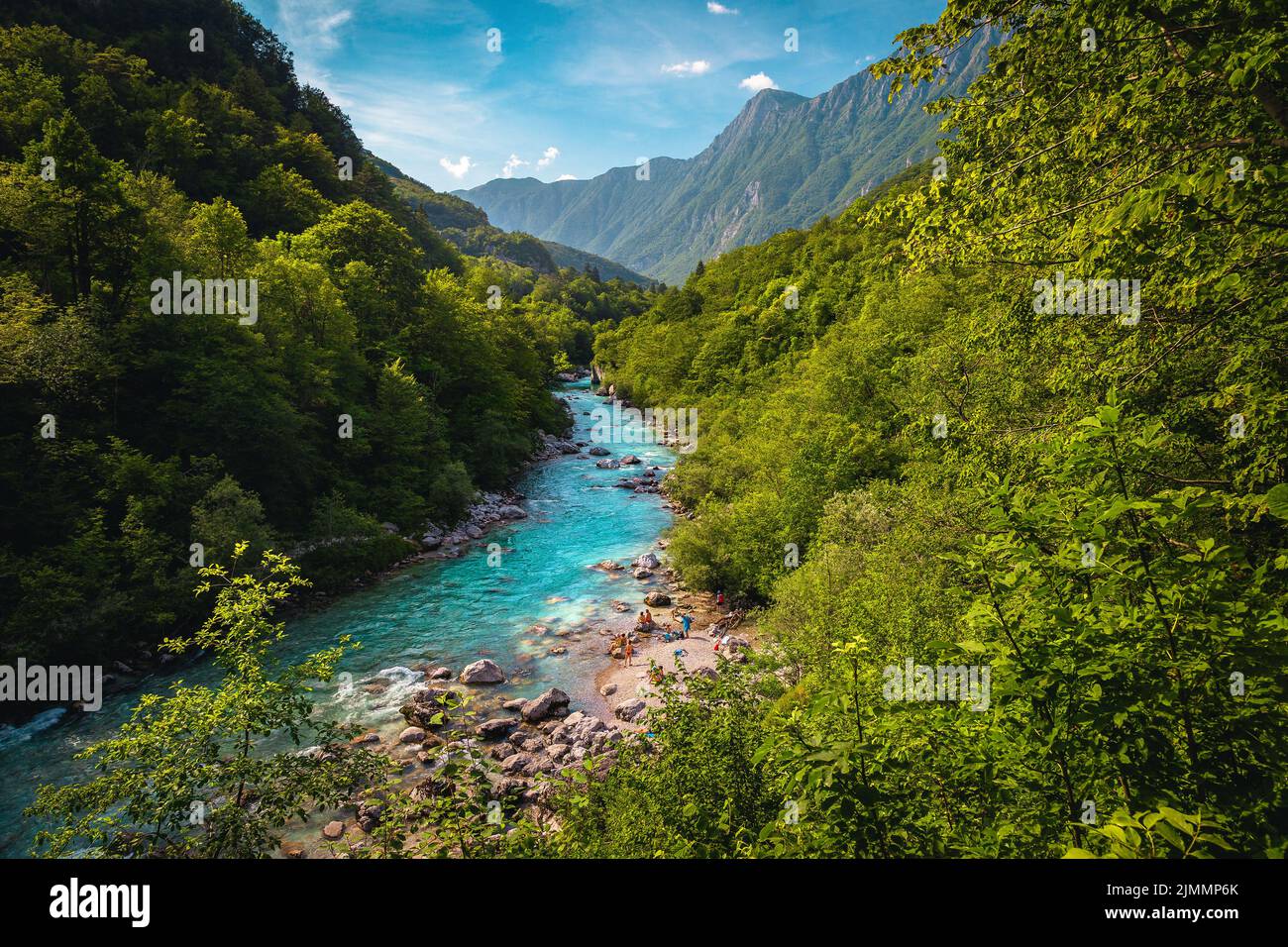 Fantastic nature scenery and kayaking destination. Stunning winding Soca river with rocky shoreline in the green forest, Kobarid, Slovenia, Europe Stock Photo