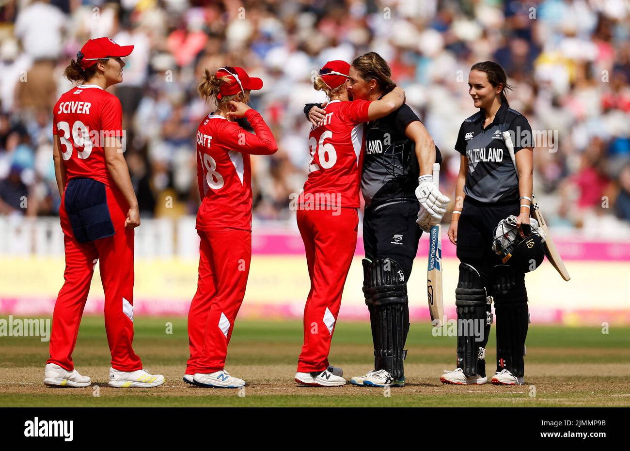 Commonwealth Games - Women's Cricket T20 - England v New Zealand - Bronze Medal - Edgbaston Stadium, Britain - August 7, 2022 New Zealand's Sophie Devine and England's Katherine Brunt after the match REUTERS/Jason Cairnduff Stock Photo
