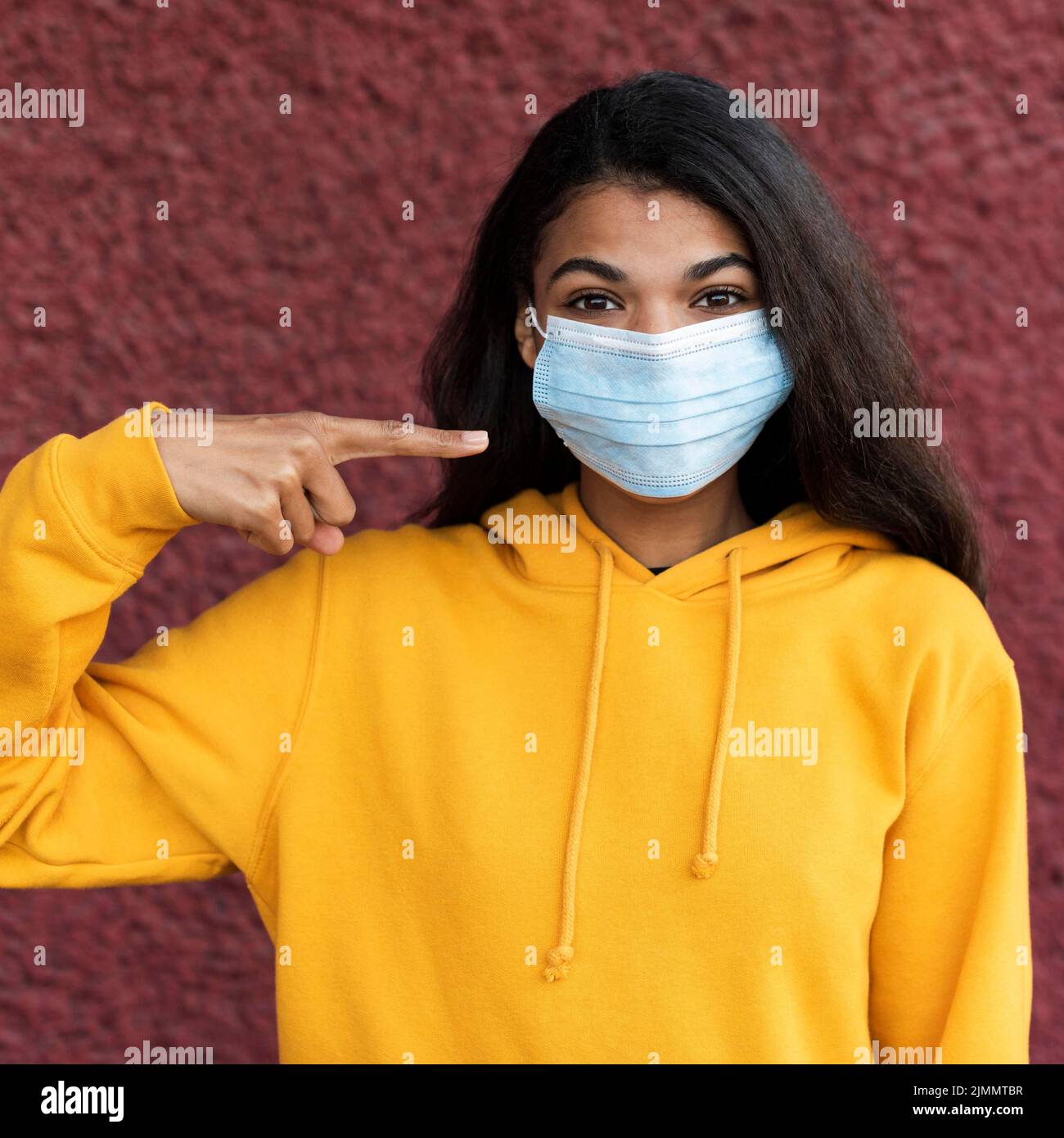 African american woman wearing medical mask Stock Photo