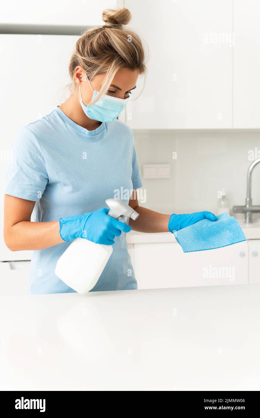 Woman wearing mask gloves hi-res stock photography and images - Alamy