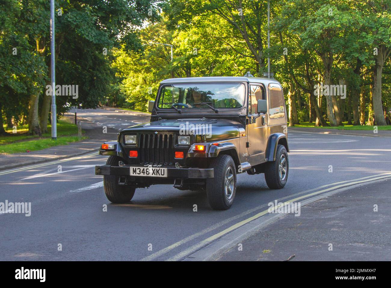 1995 90s nineties Jeep Wrangler 2464cc 5 speed manual; en-route to Lytham Hall classic car show, Lancashire, UK Stock Photo