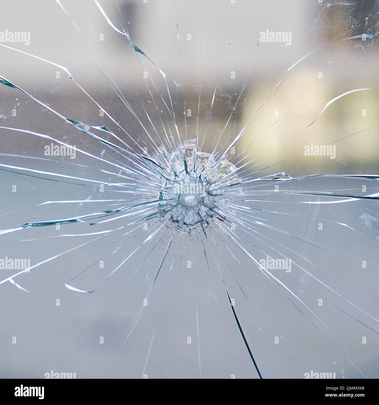 Destroyed window pane from safety glass at a store Stock Photo