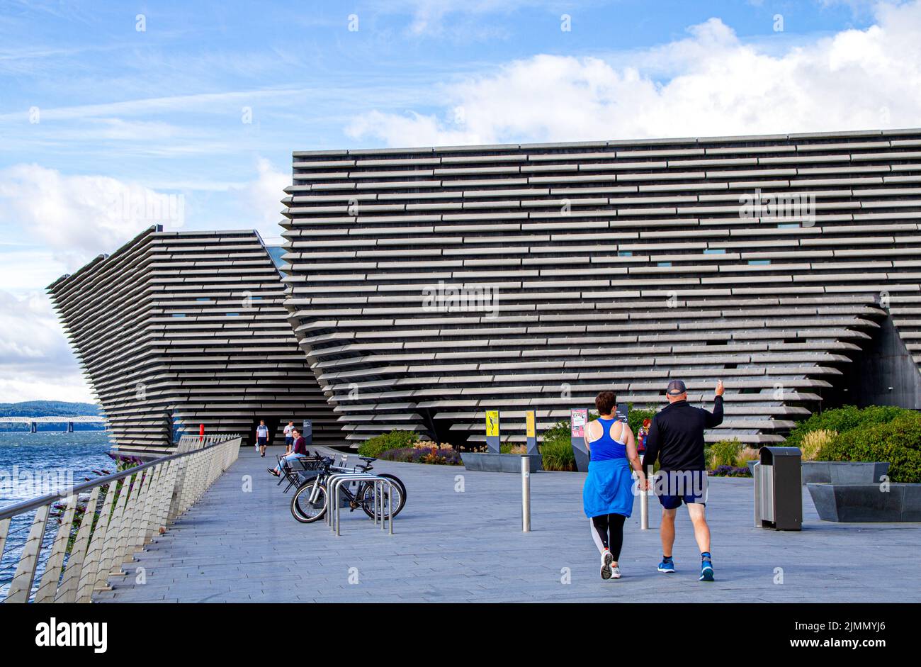 Dundee, Tayside, Scotland, UK. 7th Aug, 2022. UK Weather: North East Scotland experienced temperatures of 22°C during glorious sunbursts and the occasional strong breeze. A few tourists stopped by the RRS Discovery ship and the V&A Design Museum along the Dundee Waterfront because it was such a beautiful Sunday morning. Credit: Dundee Photographics/Alamy Live News Stock Photo