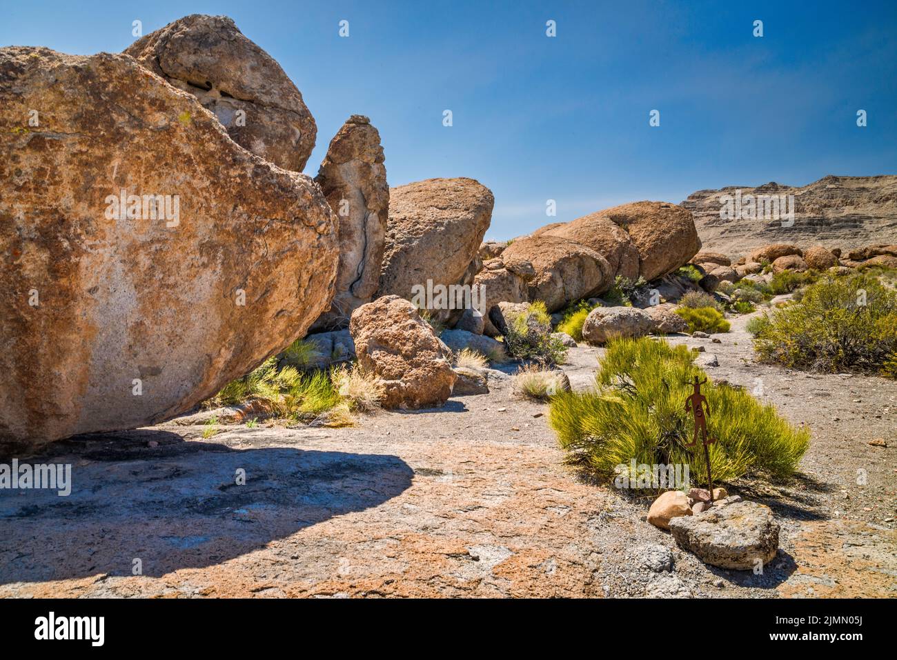 Petroglyphs at tuff rock boulder, trail marker, Crystal Wash, Pahranagat Valley, near Ash Springs, Nevada, USA Stock Photo