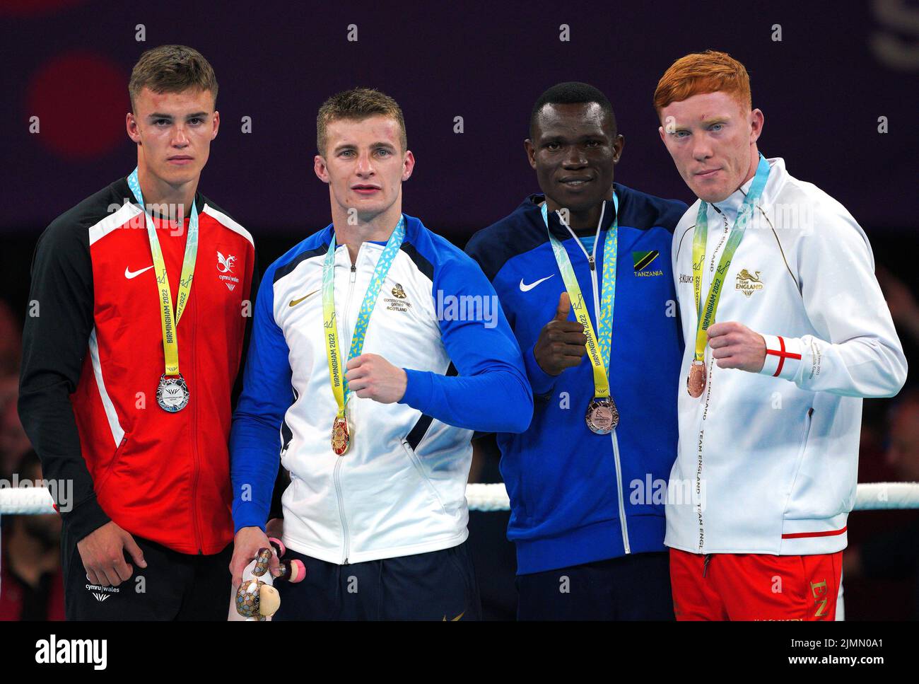 Wales' Bevan Taylor, silver, Scotland's Sean Lazzerini, gold, Tanzania's Yusuf Lu Changalawe, bronze and England's Aaron Bowen, bronze after the Men's Light Heavy 75-80kg boxing at The NEC on day ten of the 2022 Commonwealth Games in Birmingham. Picture date: Sunday August 7, 2022. Stock Photo