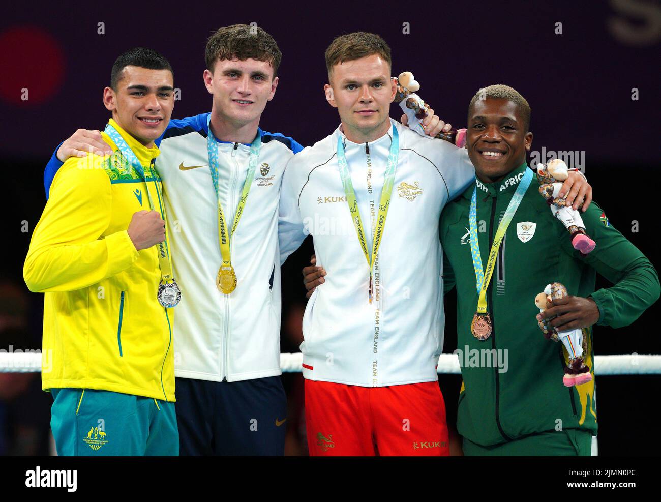 Australia's Callum Peters, Silver, Scotland's Sam Hickey wins Gold, Englands Lewis Richardson, Bronze, and South Africa's Simnikiwi Bongco, bronze in the Men's Middle (71-75kg) Final at The NEC on day ten of the 2022 Commonwealth Games in Birmingham. Picture date: Sunday August 7, 2022. Stock Photo
