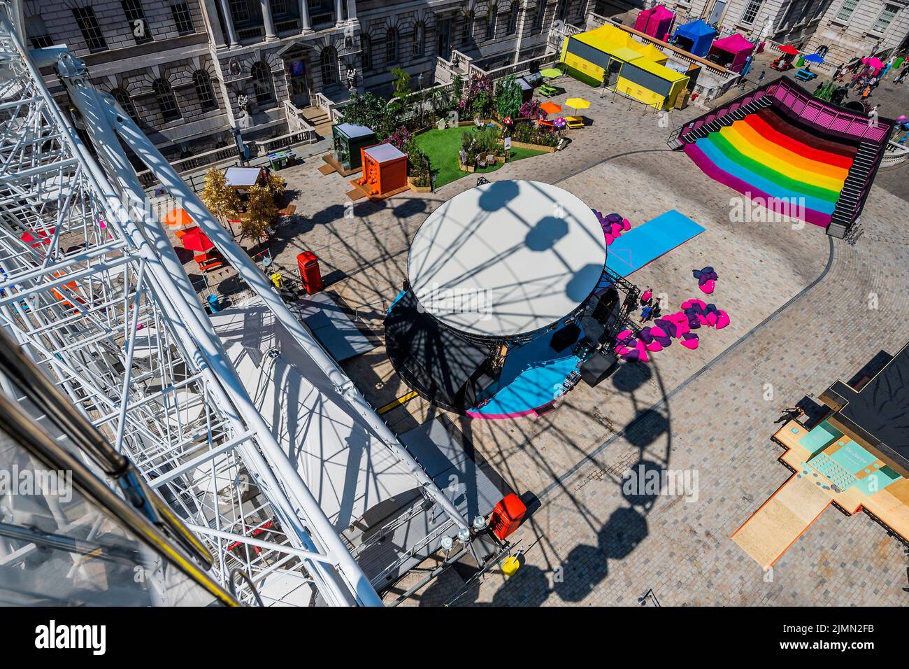 London, UK. 7th Aug, 2022. The view from the ferris wheel of the day-to-night Sunday Street Party at Somerset House. It is part of This Bright Land, a new cultural festival created in collaboration with Gareth Pugh and Carson McColl, which runs until 29 August 2022. Credit: Guy Bell/Alamy Live News Stock Photo