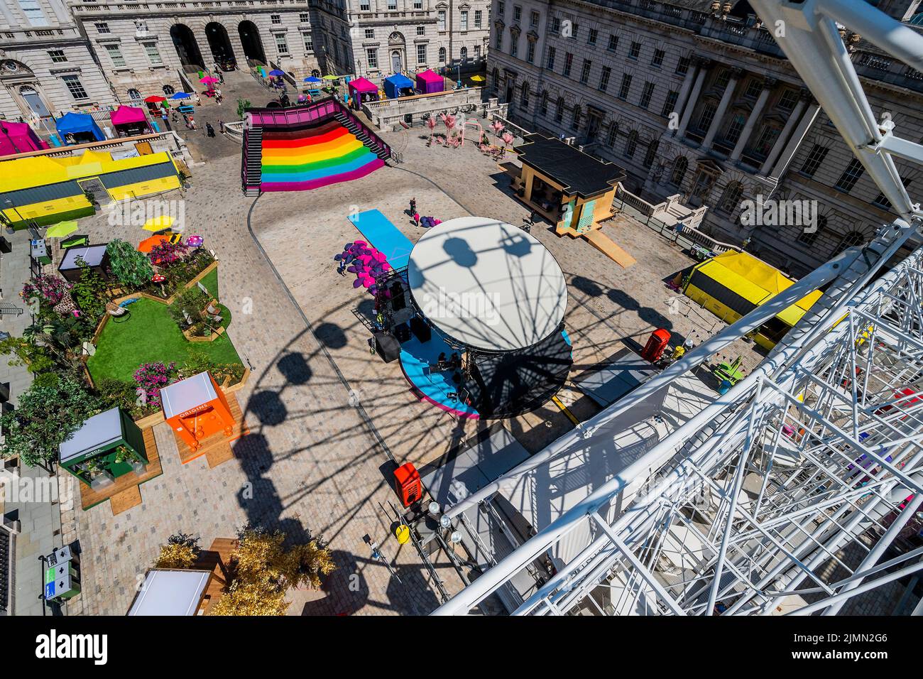 London, UK. 7th Aug, 2022. The view from the ferris wheel of the day-to-night Sunday Street Party at Somerset House. It is part of This Bright Land, a new cultural festival created in collaboration with Gareth Pugh and Carson McColl, which runs until 29 August 2022. Credit: Guy Bell/Alamy Live News Stock Photo