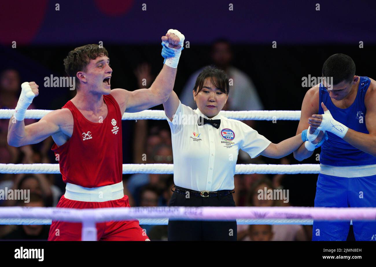 Scotland's Sam Hickey (Red) after winning gold against Australia's Callum Peters (Blue) in the Men's Middle (71-75kg) Final at The NEC on day ten of the 2022 Commonwealth Games in Birmingham. Picture date: Sunday August 7, 2022. Stock Photo