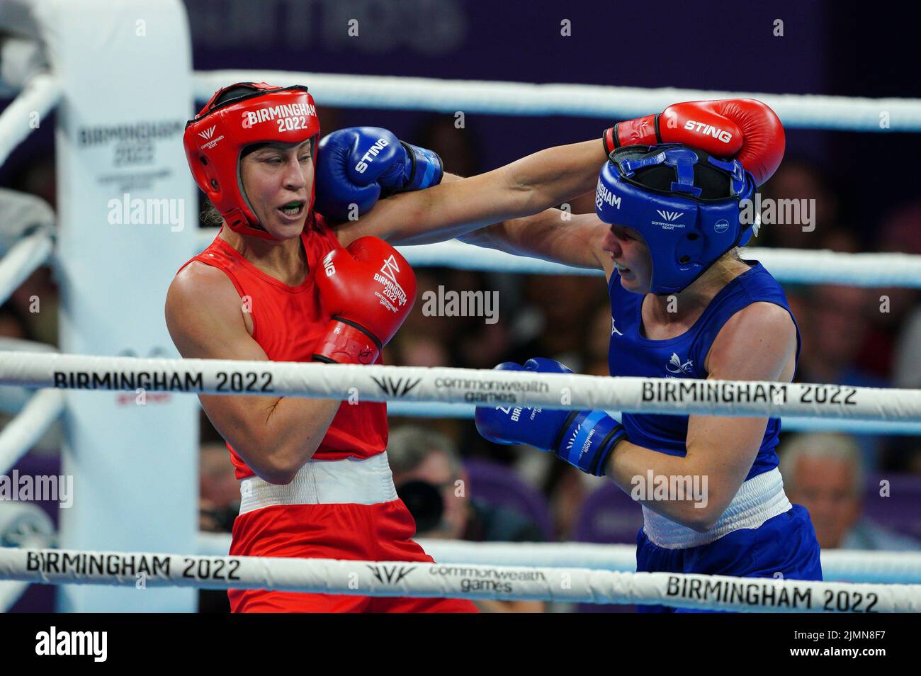 Australia's Kaye Frances Scott (Red) and Wales's Rosie Eccles (Blue) in the Women's Light Middle (66-70kg) Final at The NEC on day ten of the 2022 Commonwealth Games in Birmingham. Picture date: Sunday August 7, 2022. Stock Photo