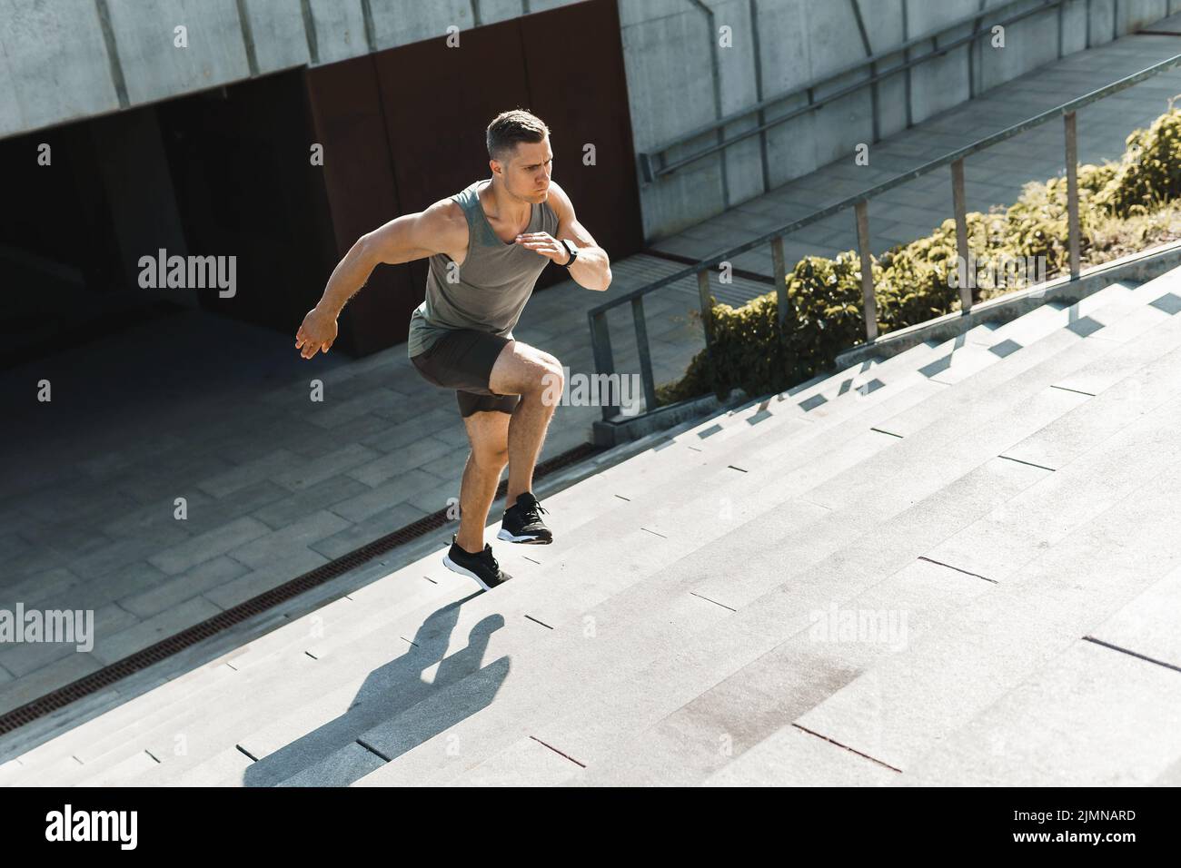 Man running up stairs hi-res stock photography and images - Alamy