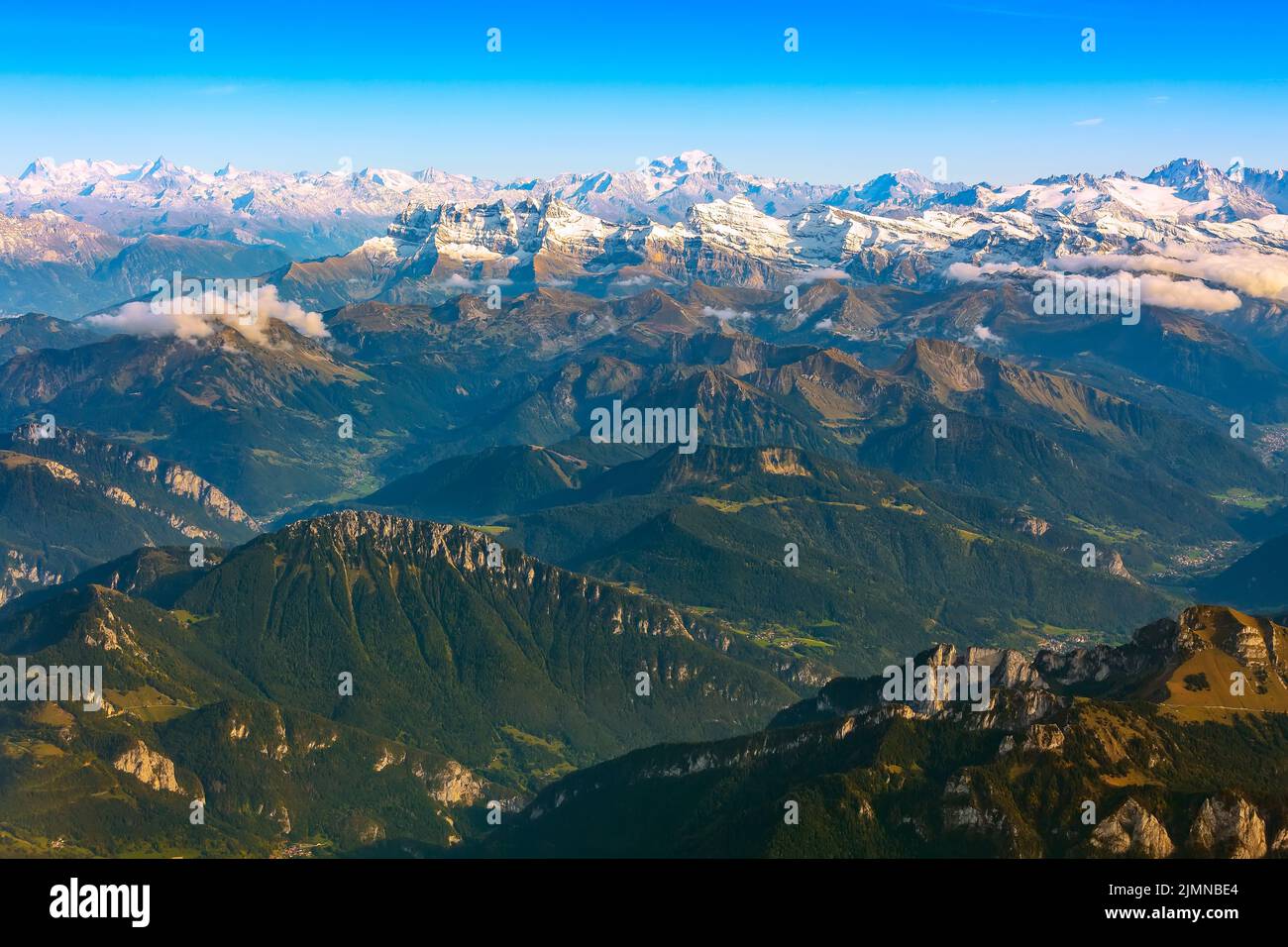 Aerial view on the Swiss Alps with snow peaks Stock Photo - Alamy