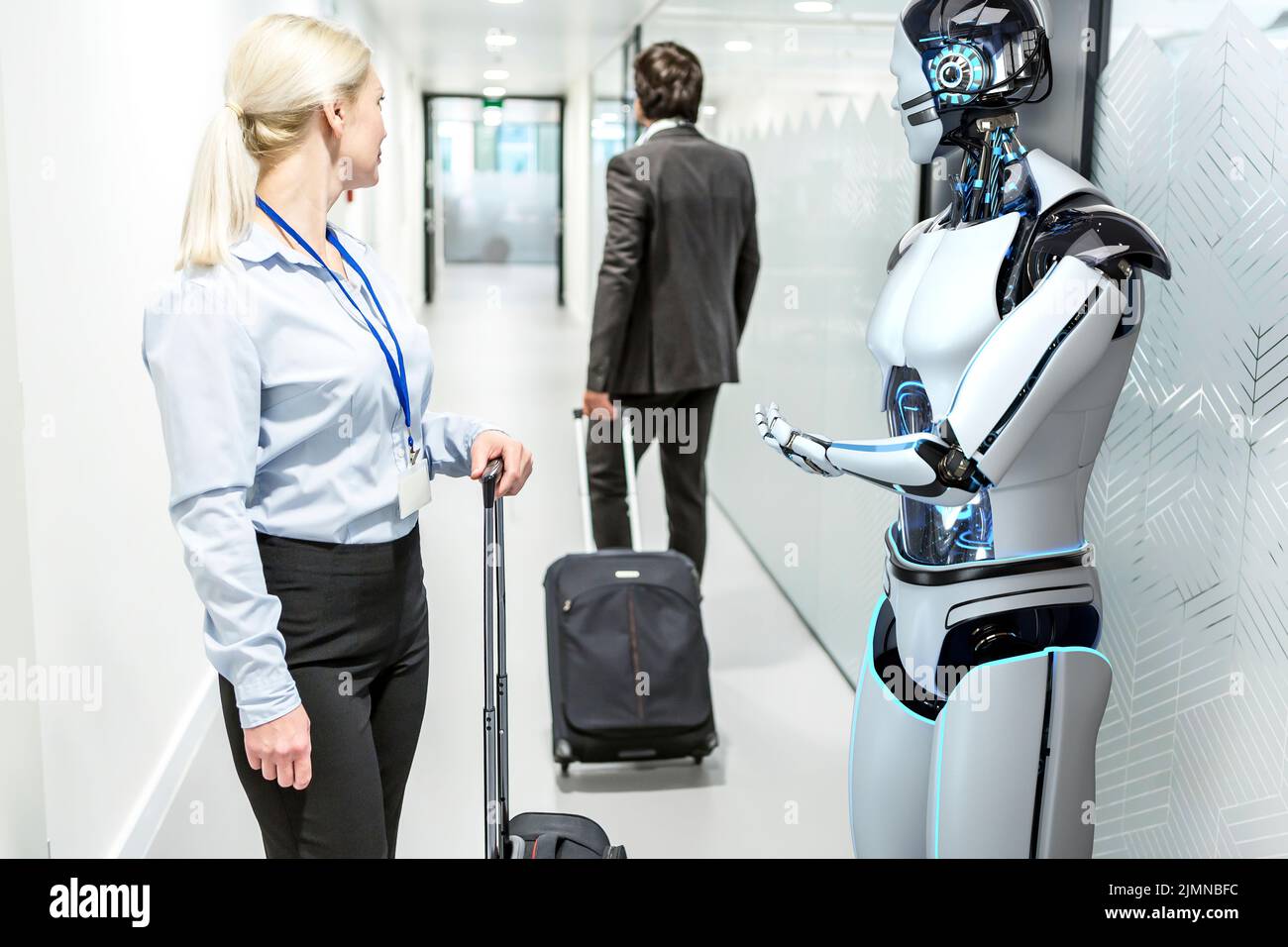 Humanoid robot assists company visitors Stock Photo